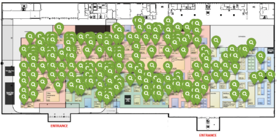 Floor plan featuring various colored sections labeled with green location markers, indicating points of interest throughout the layout.